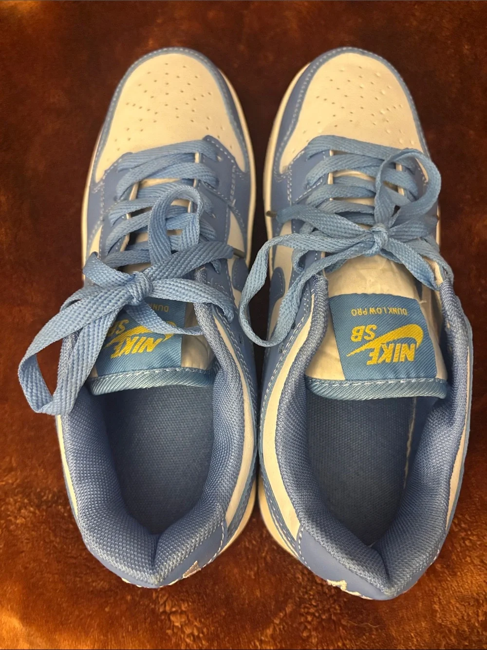 Nike Kids Light Blue and White Low-Top Sneakers — Classic Swoosh Style